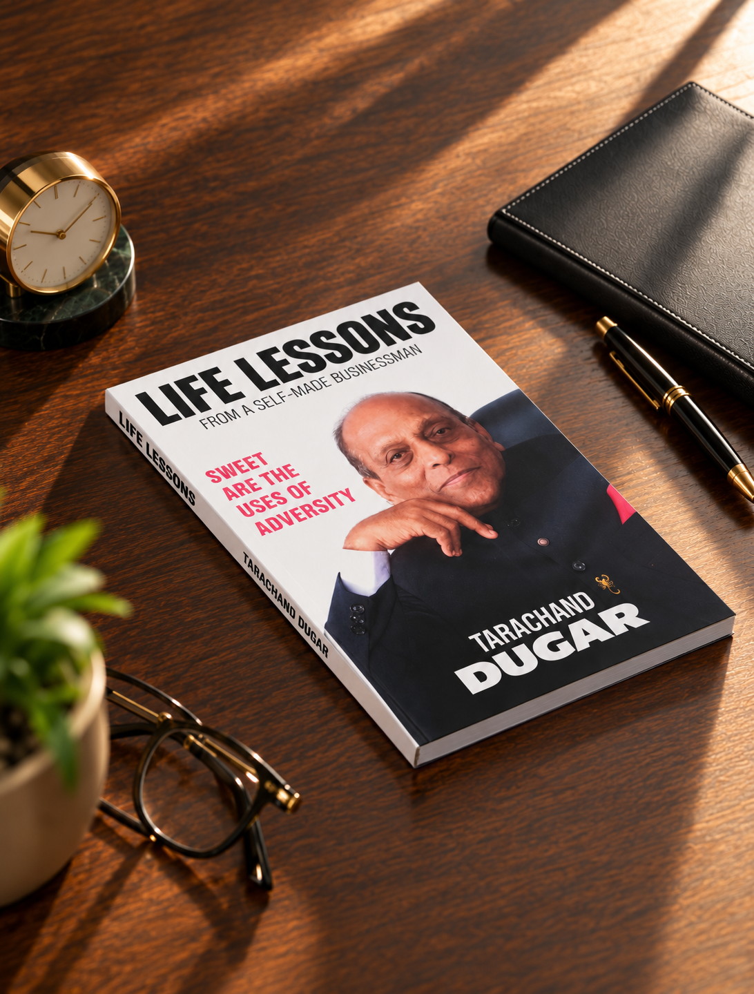 Life Lessons book displayed on a wooden writing desk